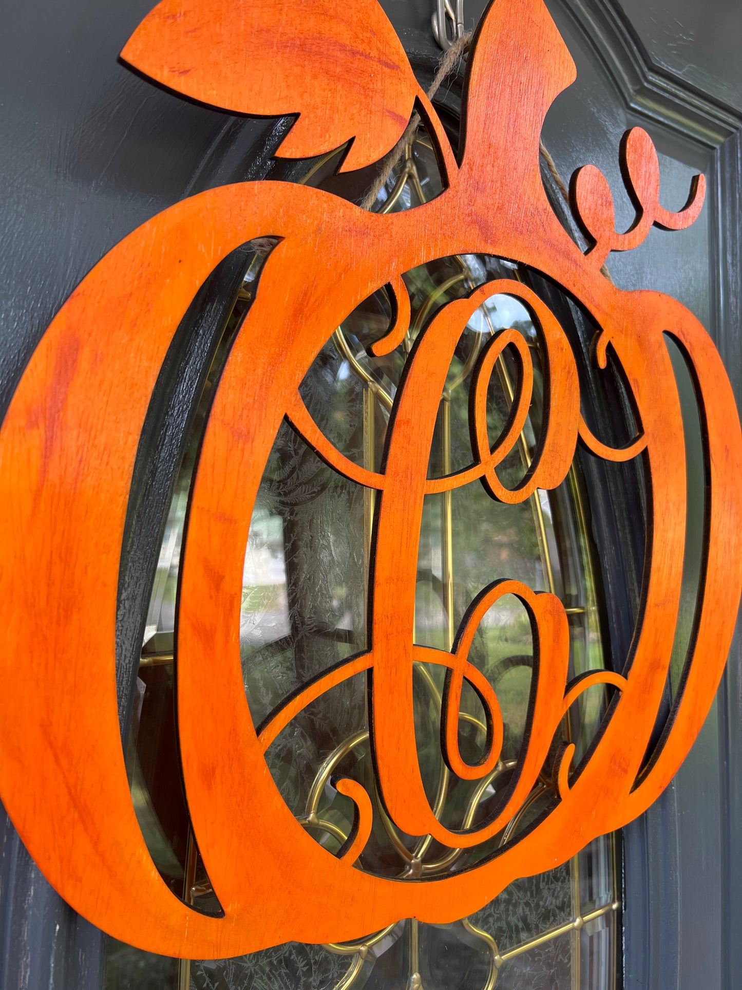 Initial pumpkin door hanger