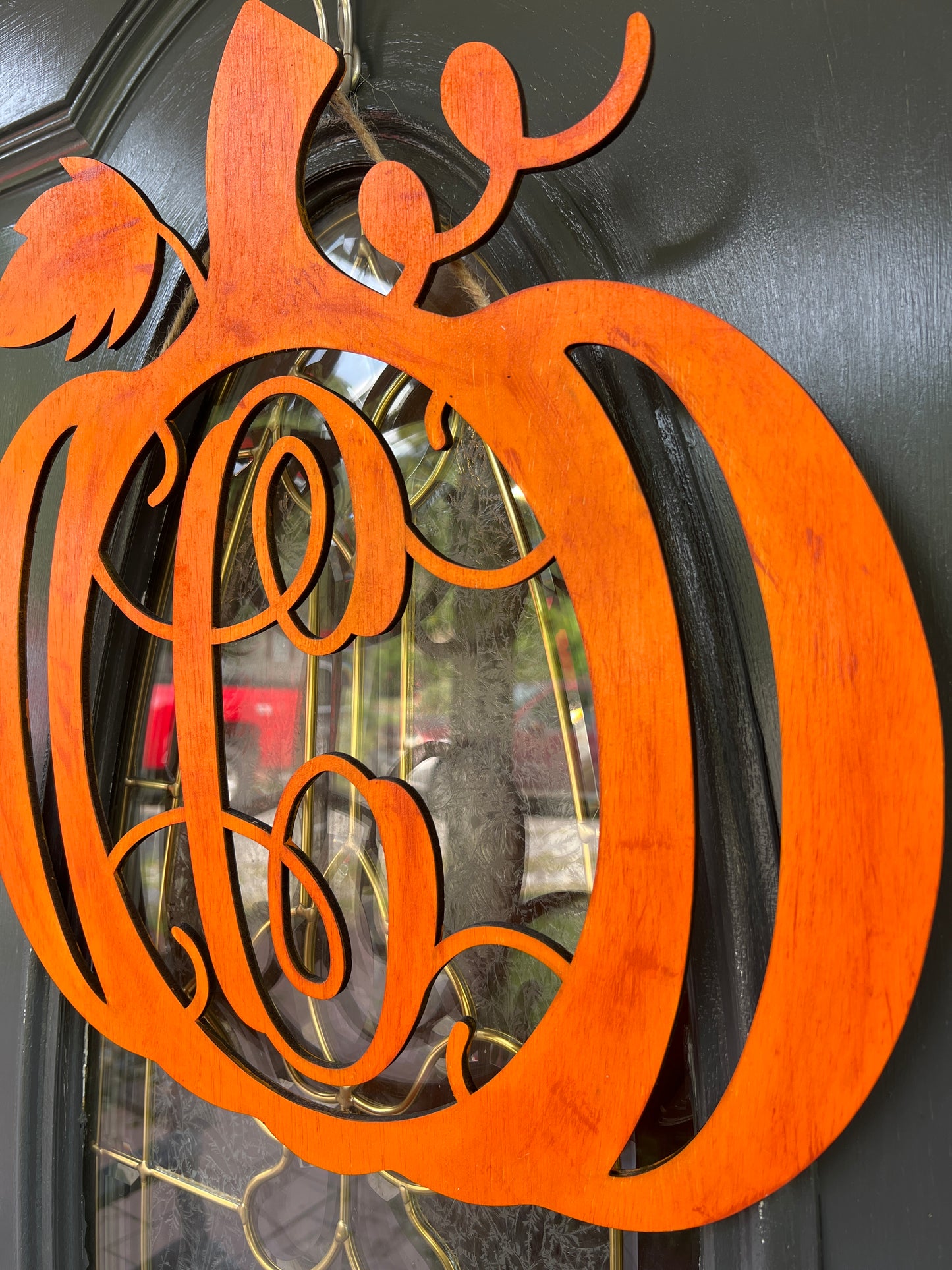 Initial pumpkin door hanger