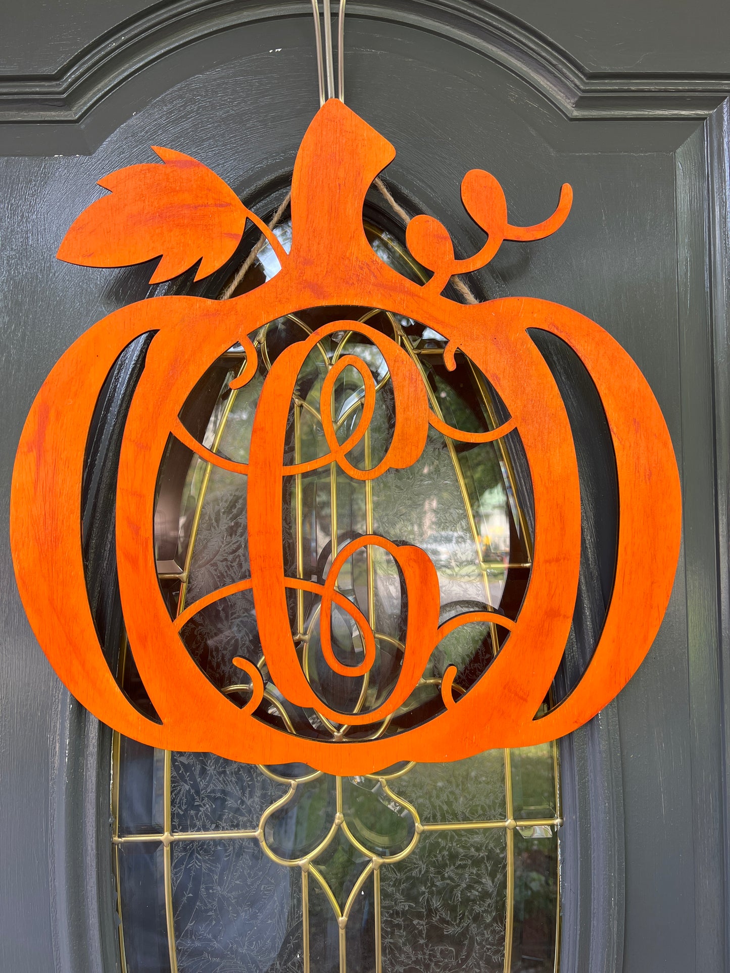 Initial pumpkin door hanger